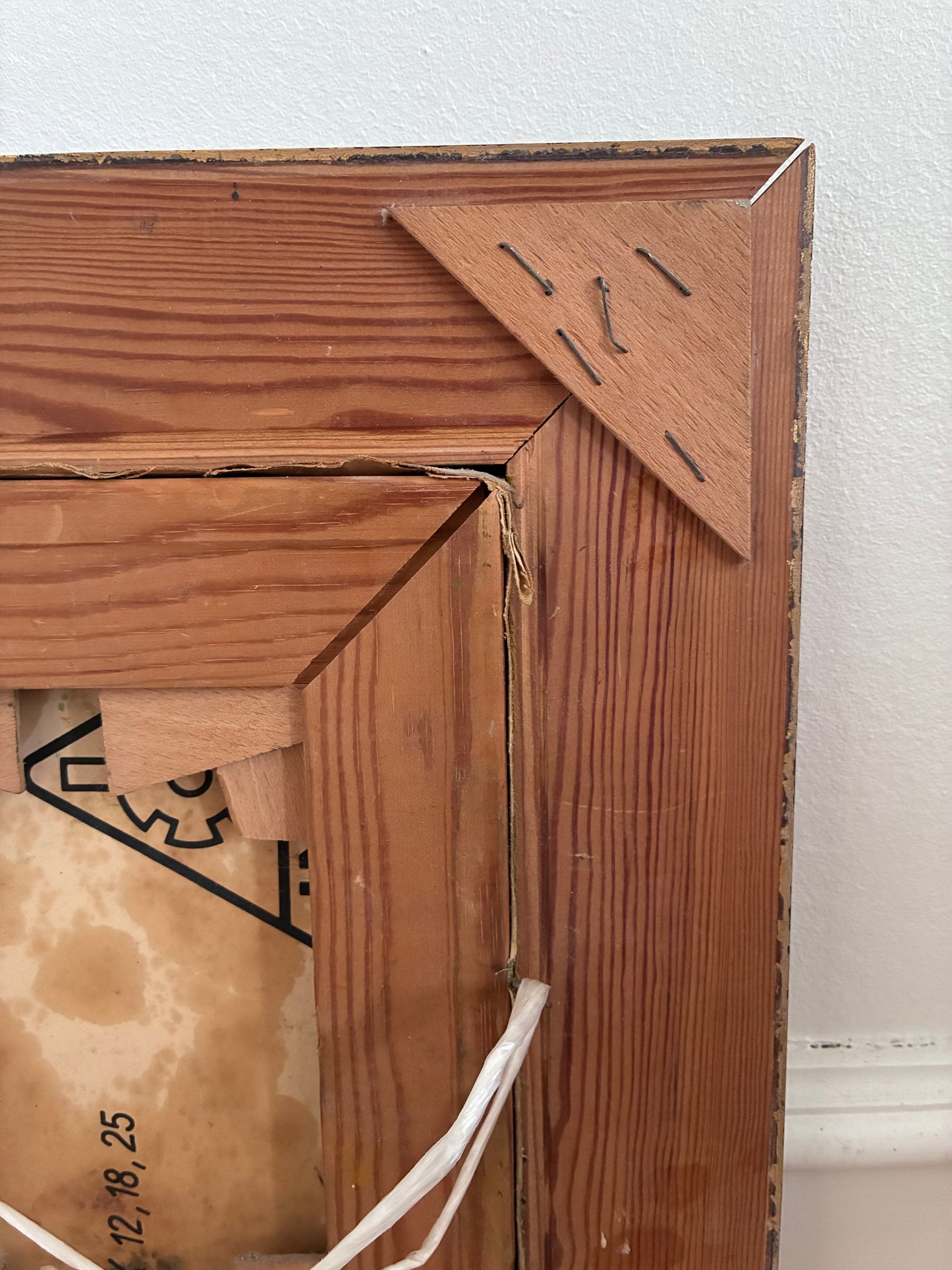 Close-up of a wooden frame with a white background